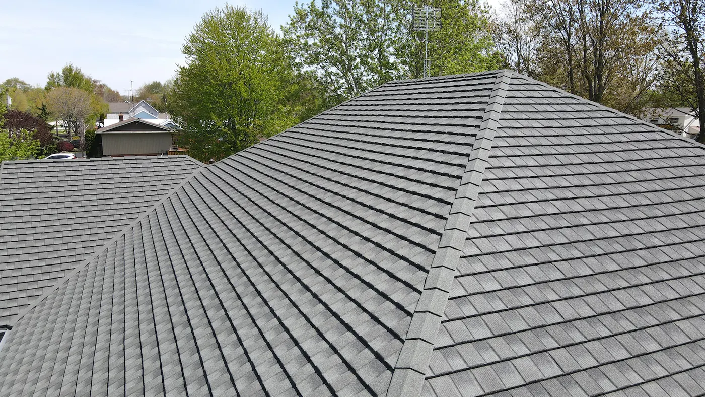 Hip roof with new gray shake-style shingles